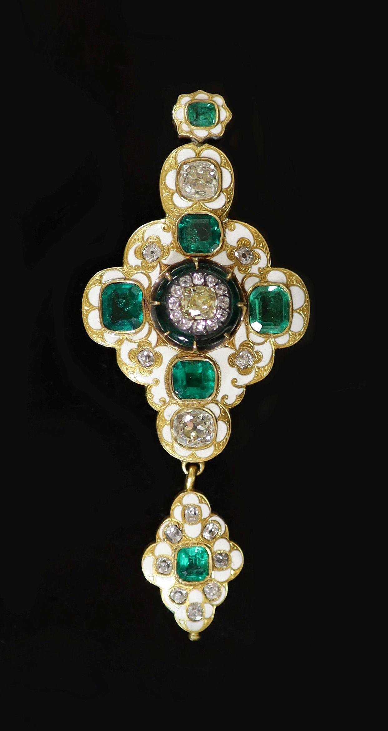 A good Victorian gold, white enamel, emerald and diamond drop pendant